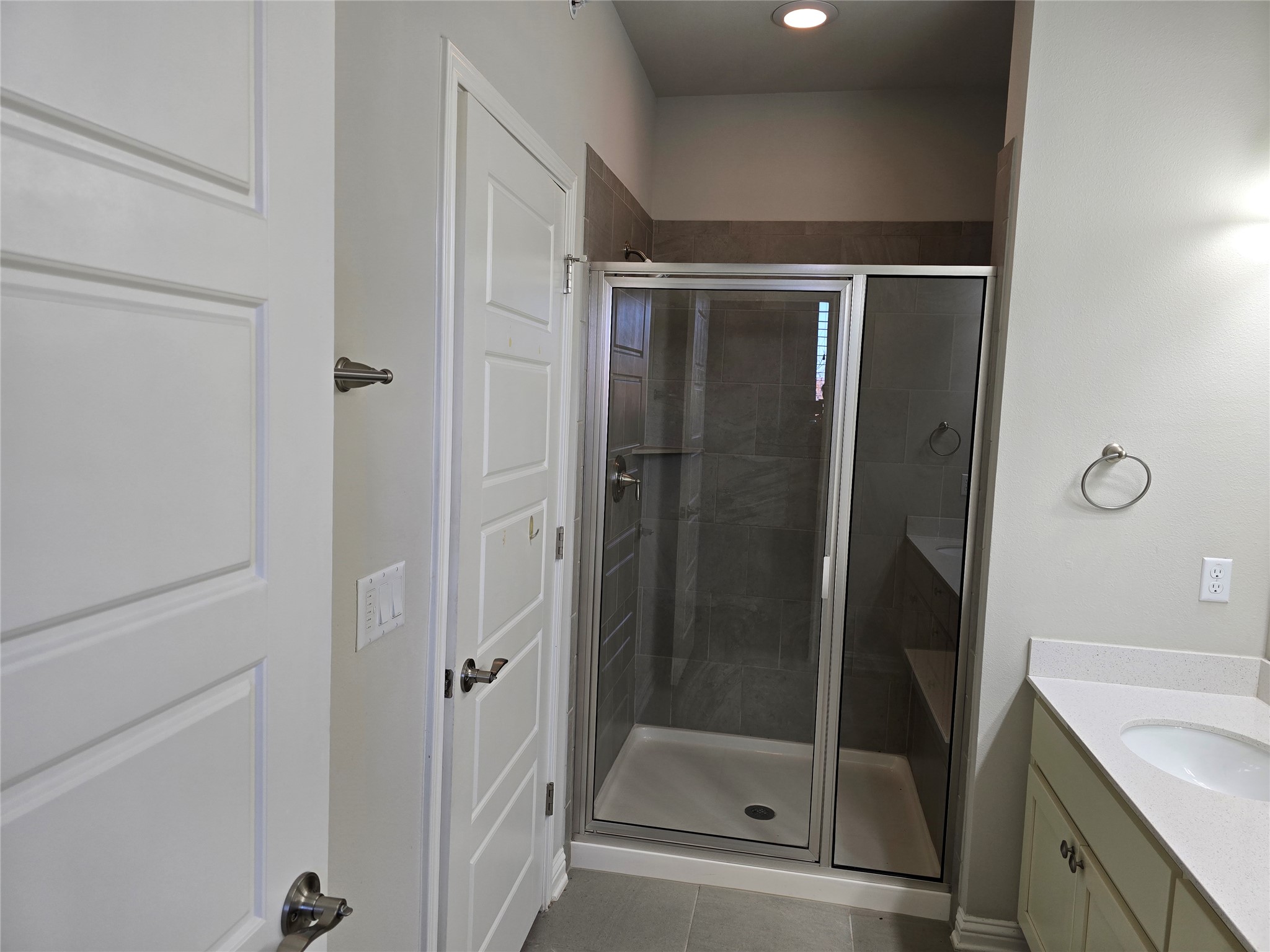 13800 Lyndhurst Street, Unit 233 Austin, TX 78717 - Photo 22 of 38 a bathroom with a shower and toilet