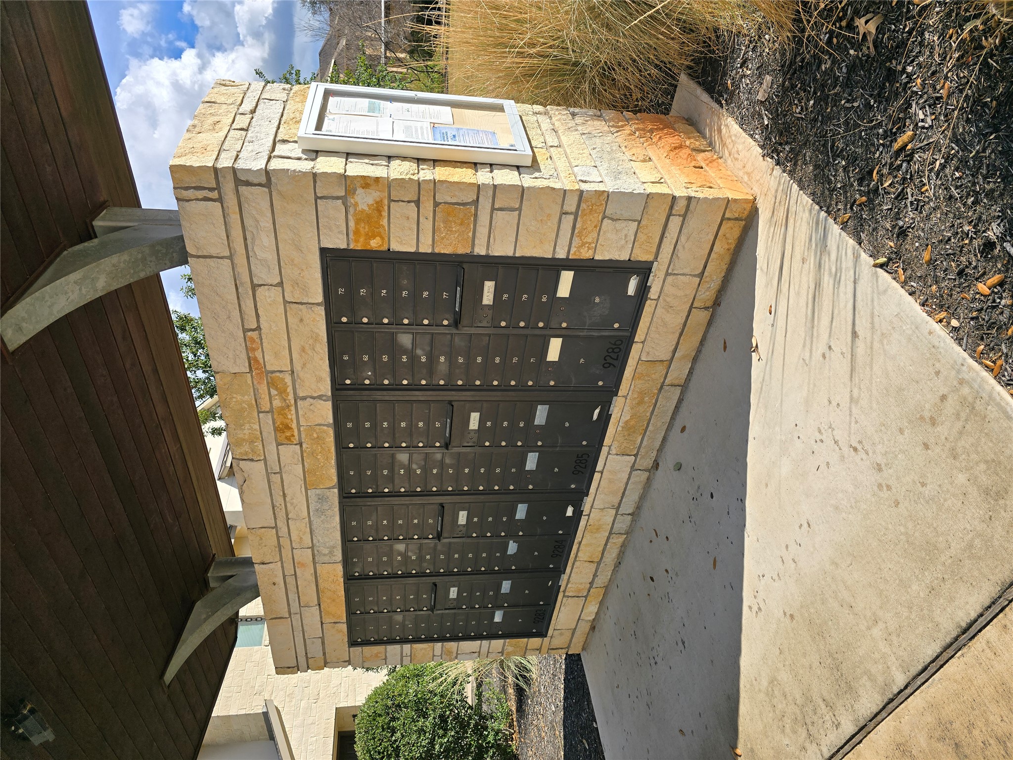 13800 Lyndhurst Street, Unit 233 Austin, TX 78717 - Photo 35 of 38 a view of a blue door with a street