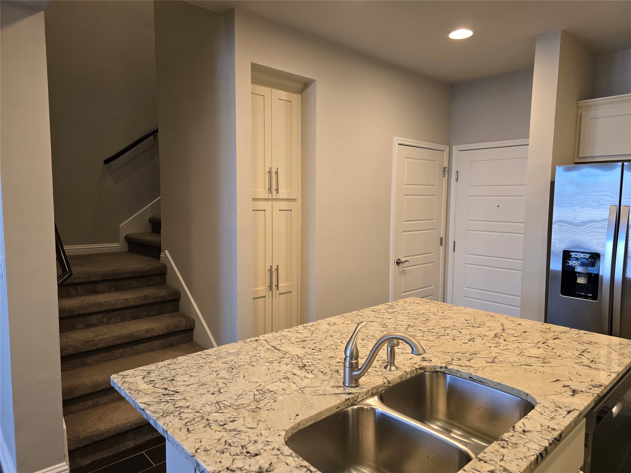 13800 Lyndhurst Street, Unit 233 Austin, TX 78717 - Photo 10 of 38 a view of a kitchen counter space and bedroom