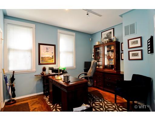 4046 North Clark Street, Unit L Chicago, IL 60613 - Photo 5 of 10 a room with furniture a piano and a window