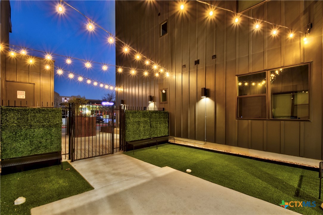 2165 Gabriels Place, Unit 1203 New Braunfels, TX 78130 - Photo 24 of 38 a view of a porch with a door