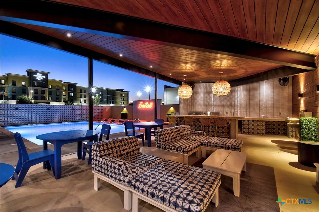 2165 Gabriels Place, Unit 1203 New Braunfels, TX 78130 - Photo 3 of 38 a outdoor space with patio lots of furniture