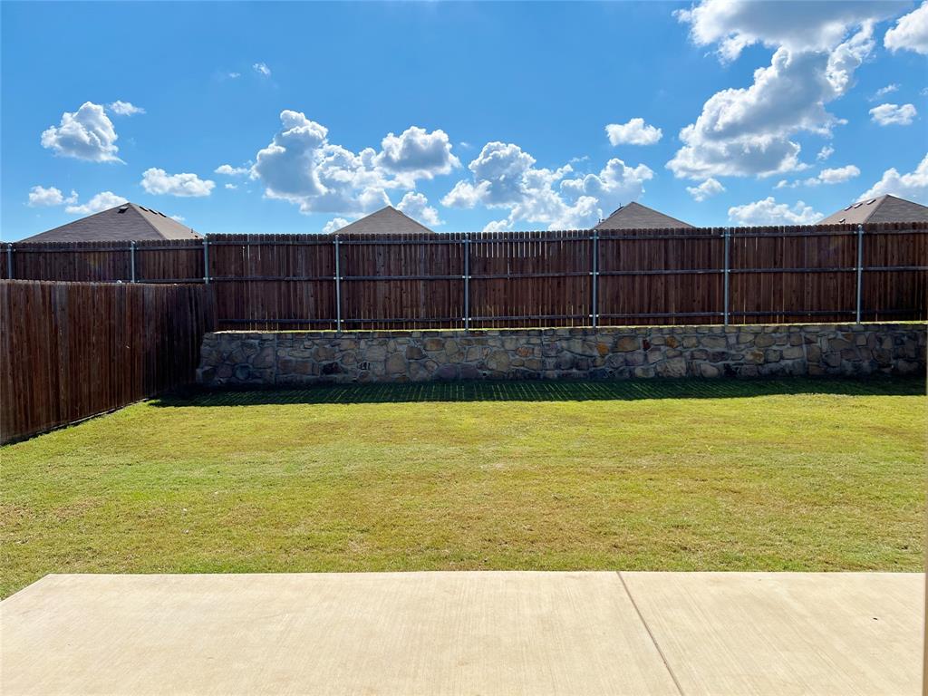 1103 Wildflower Street Ennis, TX 75119 - Photo 15 of 15 a view of a swimming pool