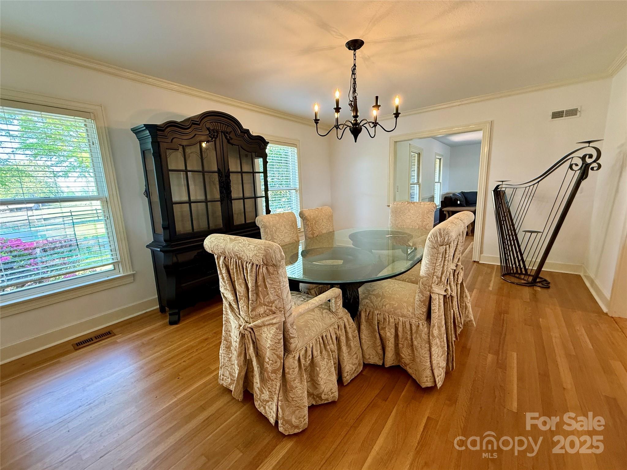820 Phillips Road Columbus, NC 28722 - Photo 20 of 32 a view of a dining room with furniture and wooden floor