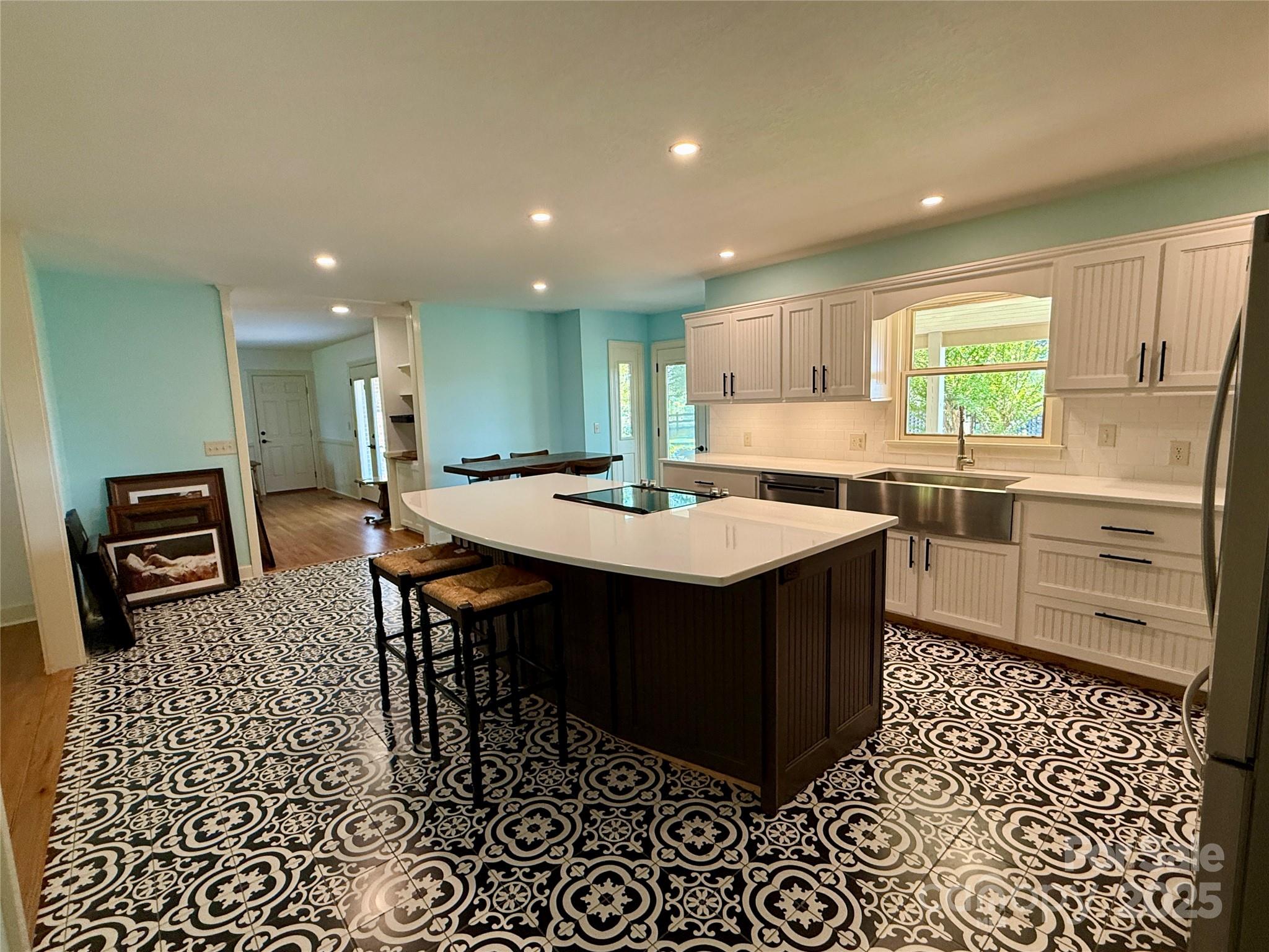 820 Phillips Road Columbus, NC 28722 - Photo 22 of 32 a kitchen with a sink a counter top space and stainless steel appliances