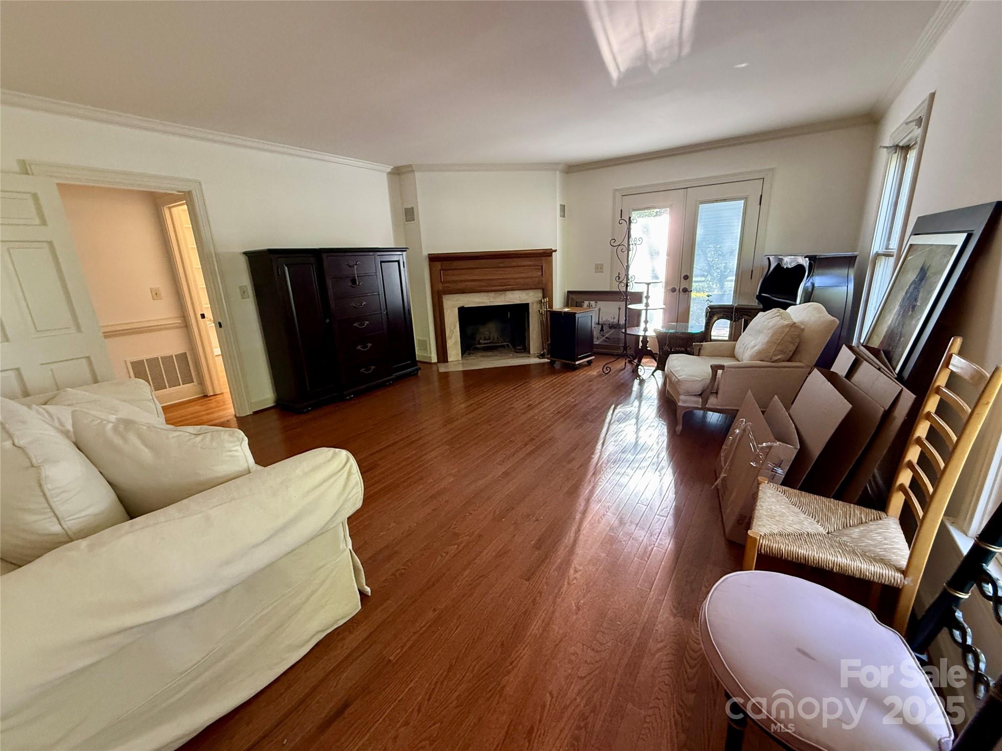 820 Phillips Road Columbus, NC 28722 - Photo 23 of 32 a living room with furniture fireplace and a flat screen tv