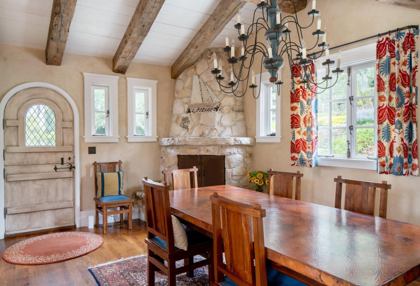 1456 Riata Road Pebble Beach, CA 93953 - Photo 12 of 32 a view of a dining room with furniture window and wooden floor