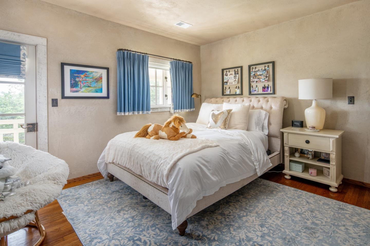 1456 Riata Road Pebble Beach, CA 93953 - Photo 18 of 32 a bedroom with a bed and a window