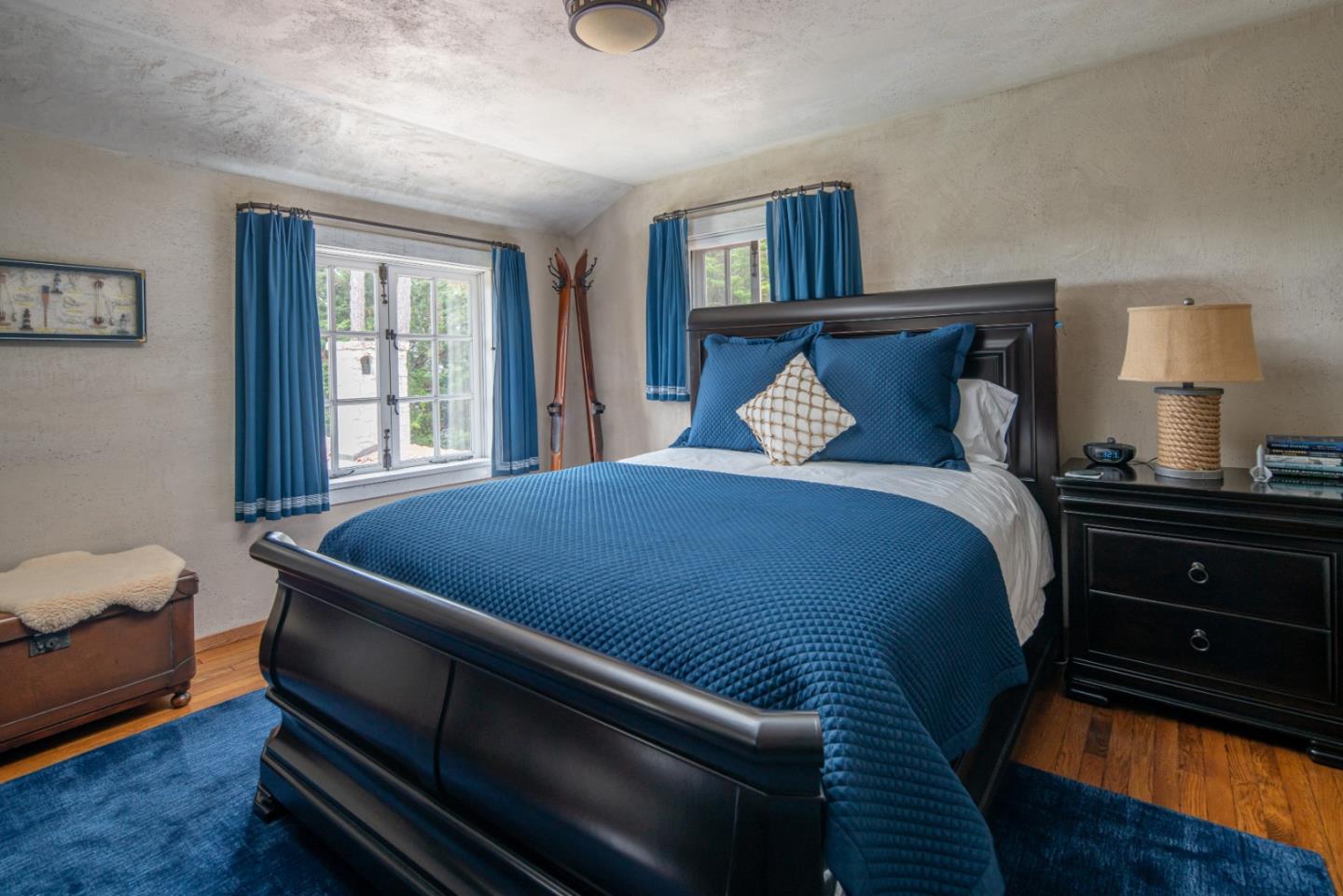 1456 Riata Road Pebble Beach, CA 93953 - Photo 19 of 32 a bedroom with a bed and window