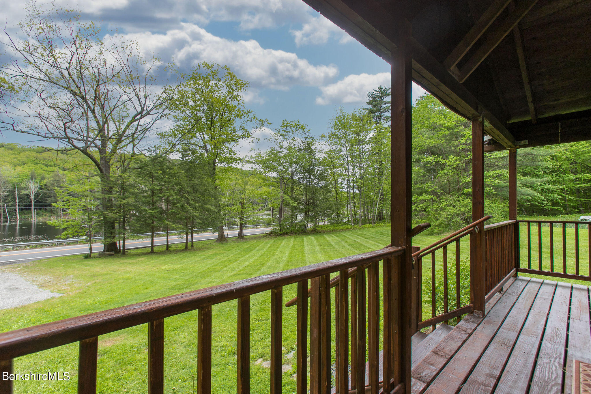 2184 Monterey Road Otis, MA 01253 - Photo 29 of 32 a view of a deck with a yard and balcony
