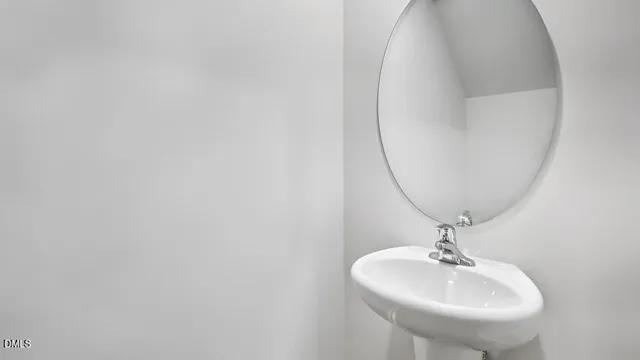 a view of an empty room and a window