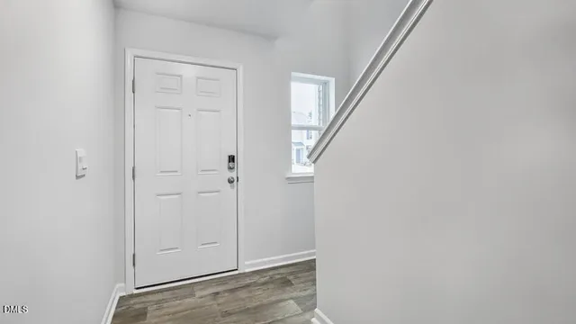a view of kitchen with wooden floor