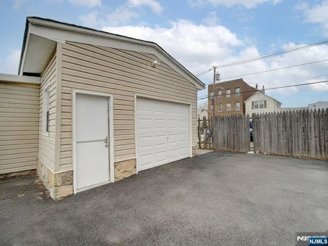 a view of a house with garage