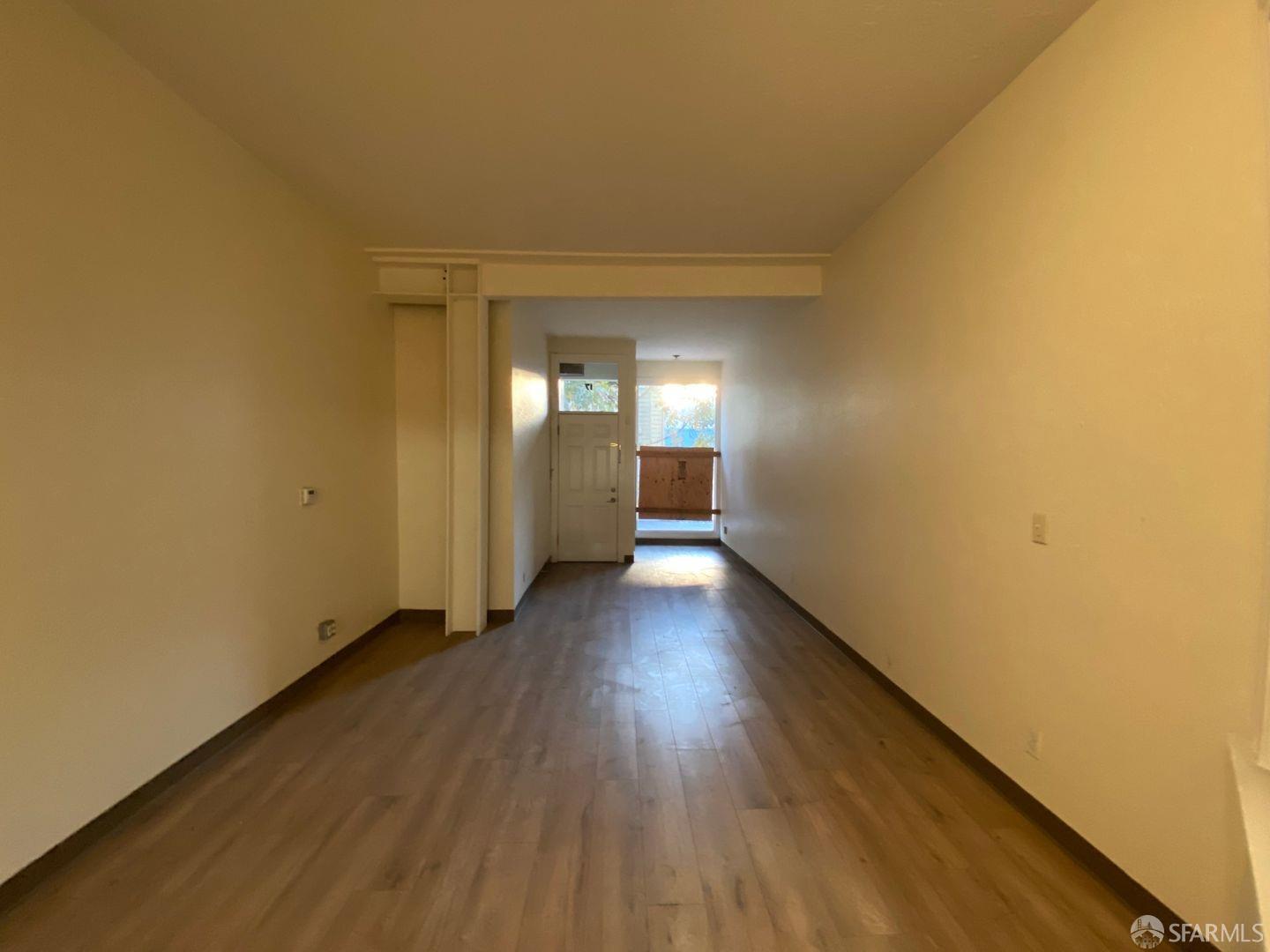17 Boardman Place San Francisco, CA 94103 - Photo 15 of 17 a view of a hallway with wooden floor