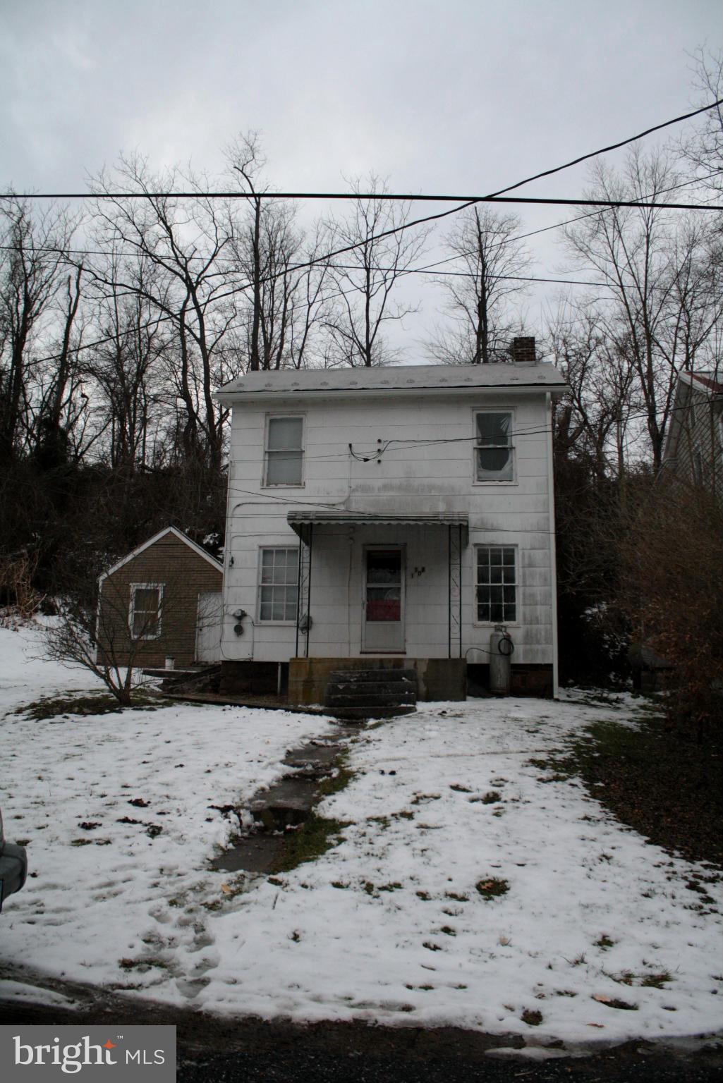 1308 Bruceville Road Keymar, MD 21757 - Photo 2 of 20 a front view of a house with a yard