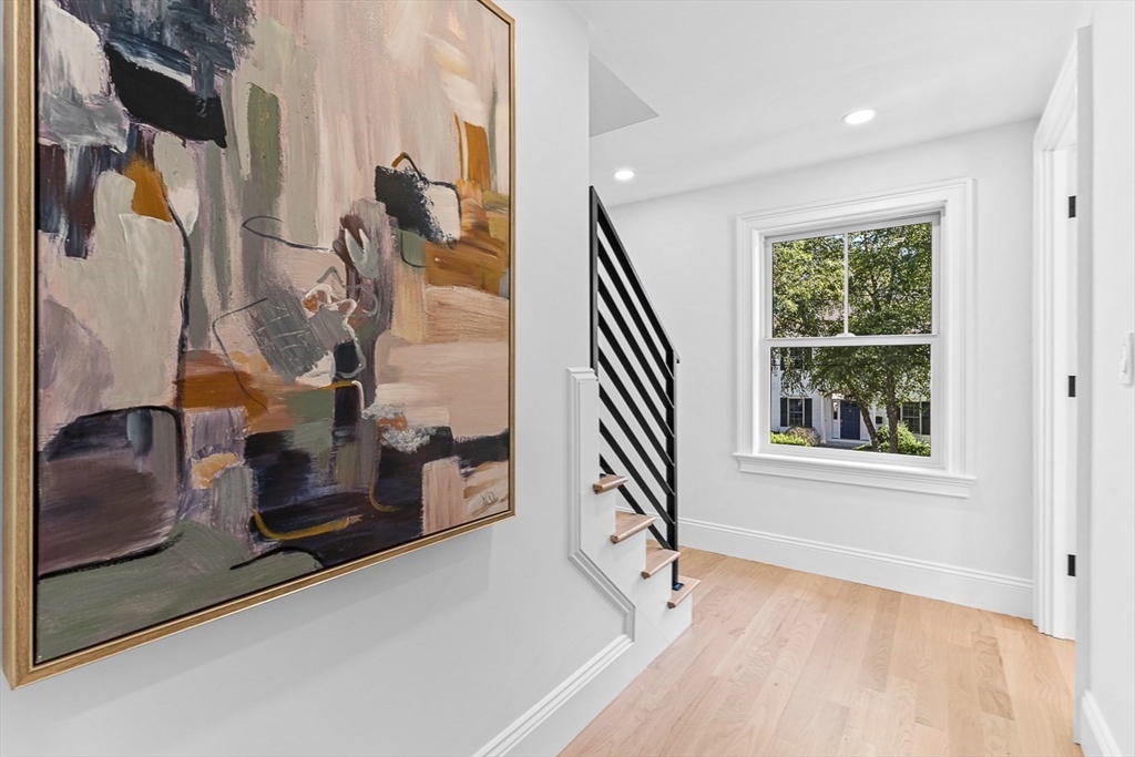 25 Thomas Road Wellesley, MA 02482 - Photo 12 of 27 a view of entryway and hall with wooden floor