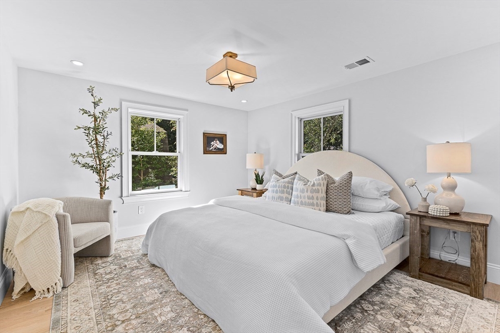 25 Thomas Road Wellesley, MA 02482 - Photo 14 of 27 a bedroom with a bed and a couch