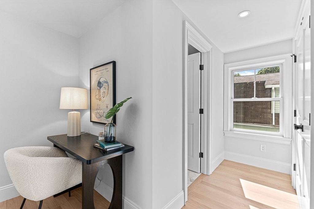 25 Thomas Road Wellesley, MA 02482 - Photo 17 of 27 a view of a workspace room with furniture and wooden floor