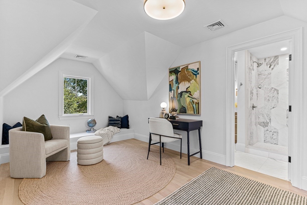 25 Thomas Road Wellesley, MA 02482 - Photo 19 of 27 a living room with furniture a rug and a window