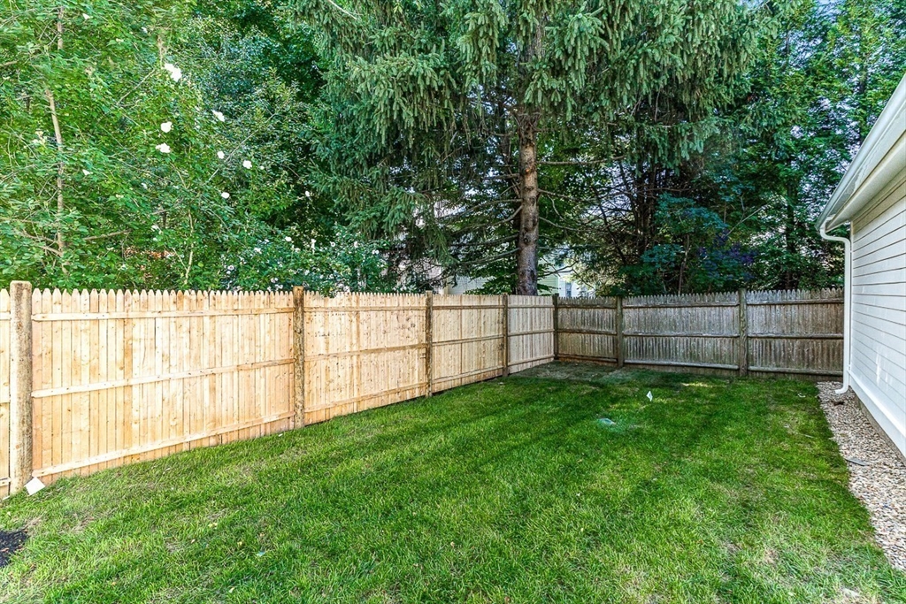 25 Thomas Road Wellesley, MA 02482 - Photo 27 of 27 a view of backyard with a fence