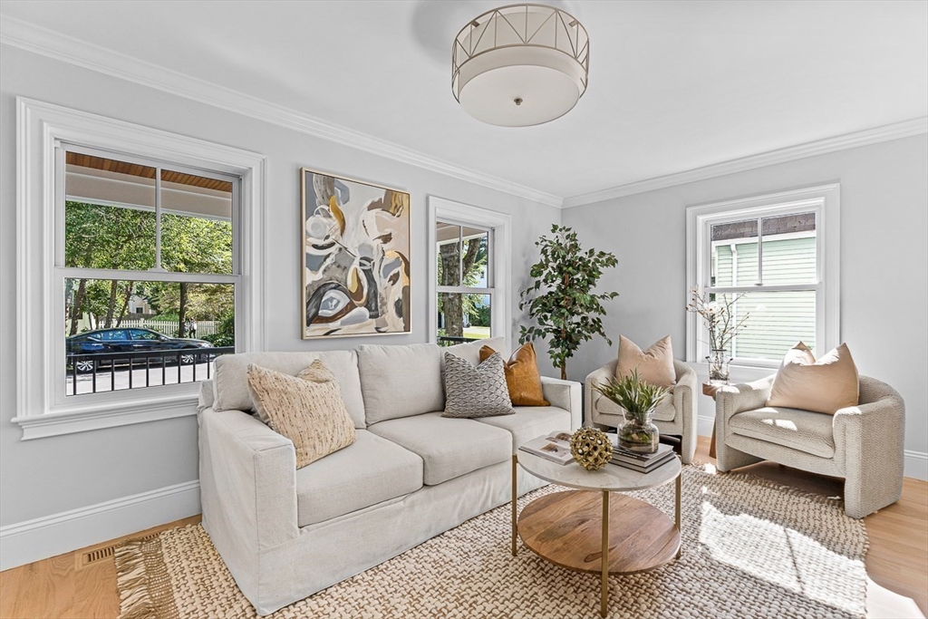 25 Thomas Road Wellesley, MA 02482 - Photo 3 of 27 a living room with furniture flowerpot and window