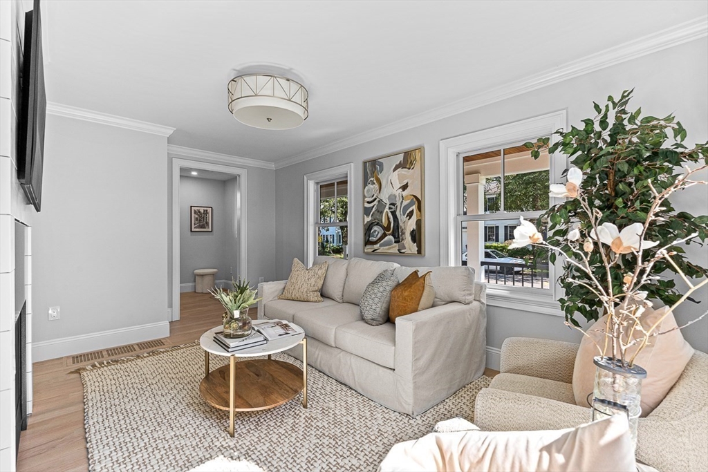 25 Thomas Road Wellesley, MA 02482 - Photo 4 of 27 a living room with furniture and a large window