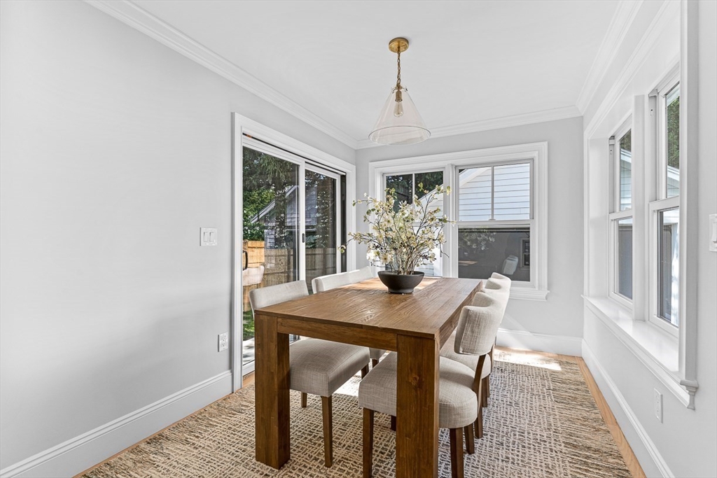 25 Thomas Road Wellesley, MA 02482 - Photo 9 of 27 a view of a dining room with furniture window and wooden floor