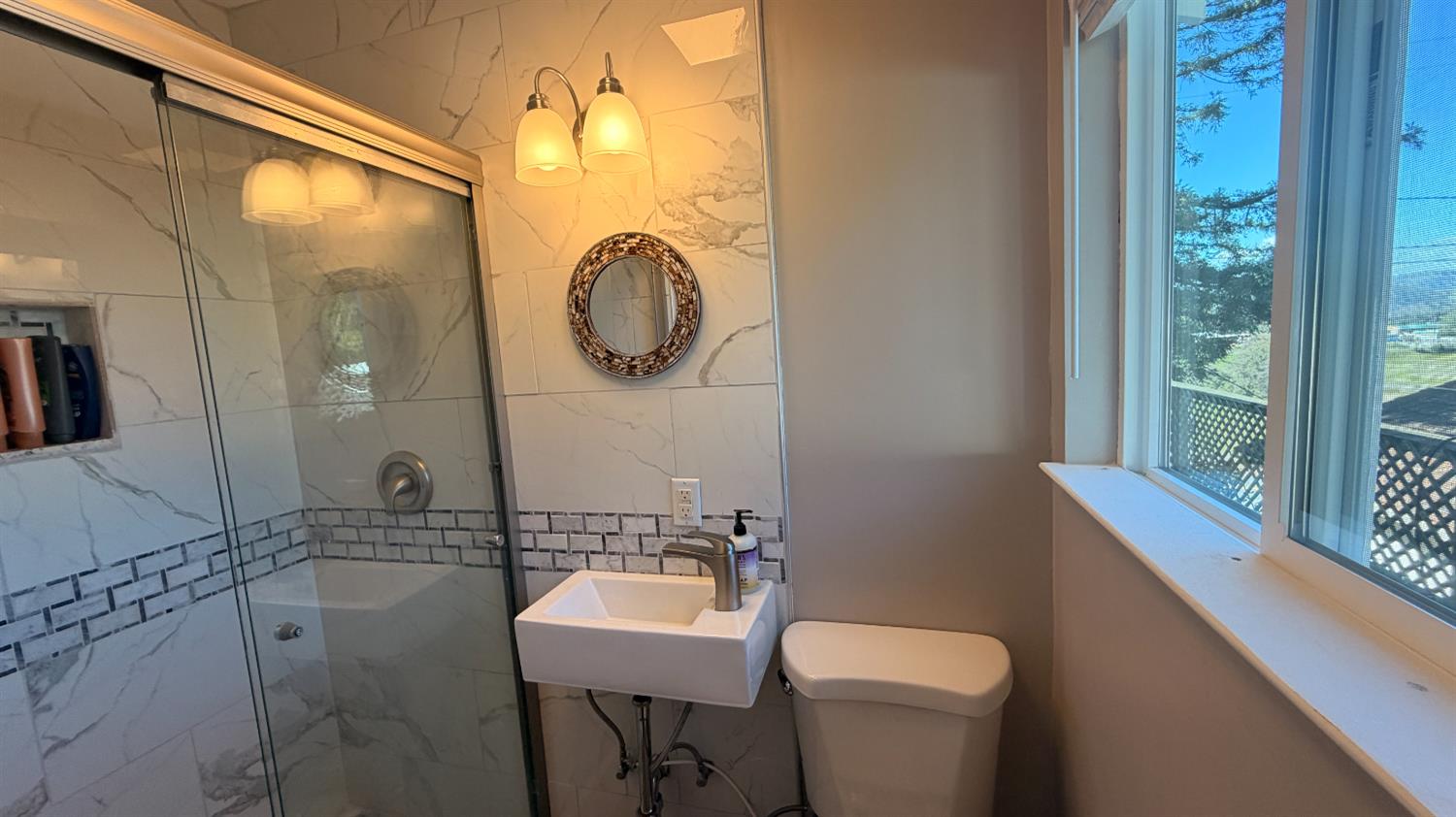 553 Russells Road San Andreas, CA 95249 - Photo 21 of 31 a bathroom with a sink a toilet and a mirror