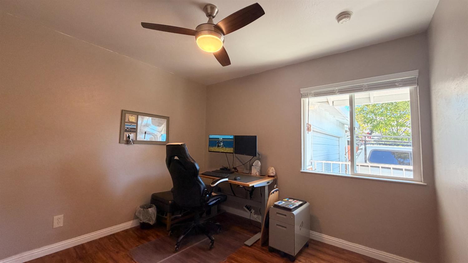 553 Russells Road San Andreas, CA 95249 - Photo 25 of 31 a view of a workspace with furniture and a window