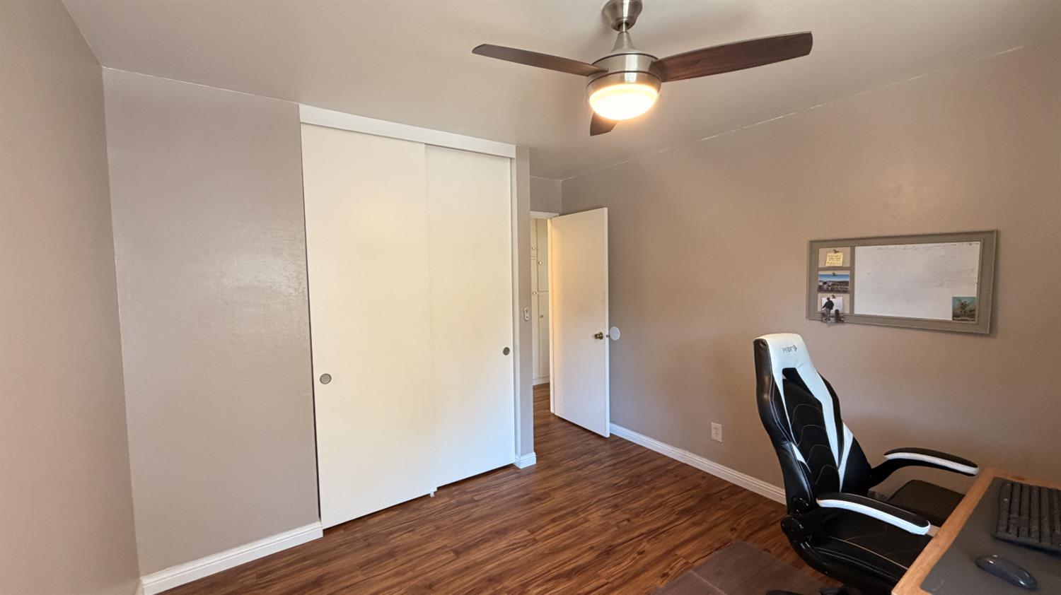553 Russells Road San Andreas, CA 95249 - Photo 26 of 31 a view of workspace with wooden floor and ceiling fan