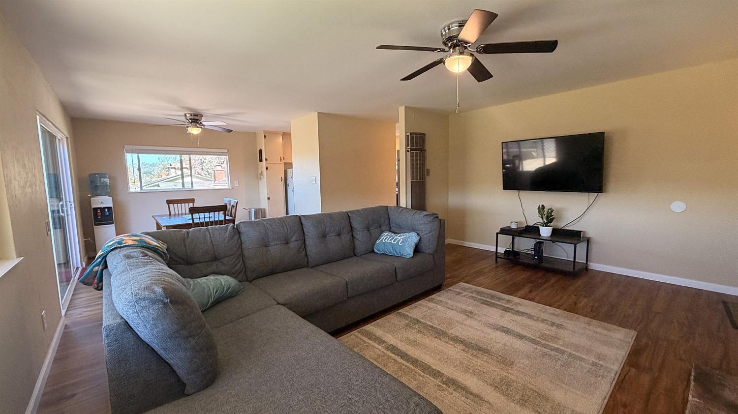 553 Russells Road San Andreas, CA 95249 - Photo 5 of 31 a living room with furniture and a flat screen tv