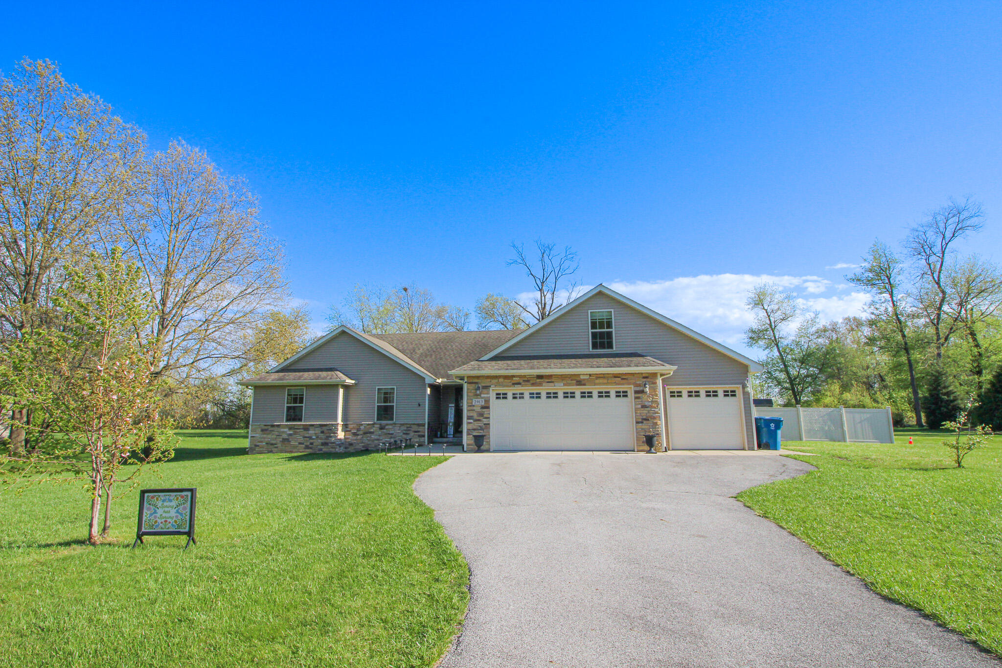2913 Cardinal Drive Wheatfield, IN 46392 - Photo 25 of 34 a front view of a house with a yard