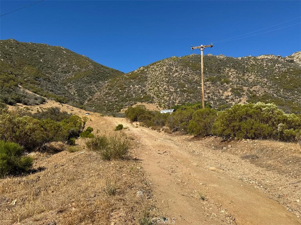 0 Chapman Road Anza, CA 92539 - Photo 2 of 17 a view of a field with a snow in the background