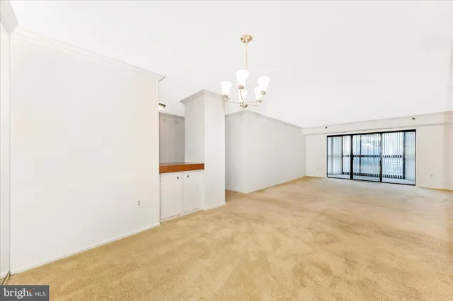a bathroom with a sink a toilet and a large mirror