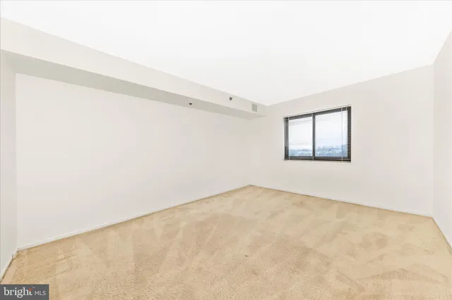a bathroom with a shower and a bath tub