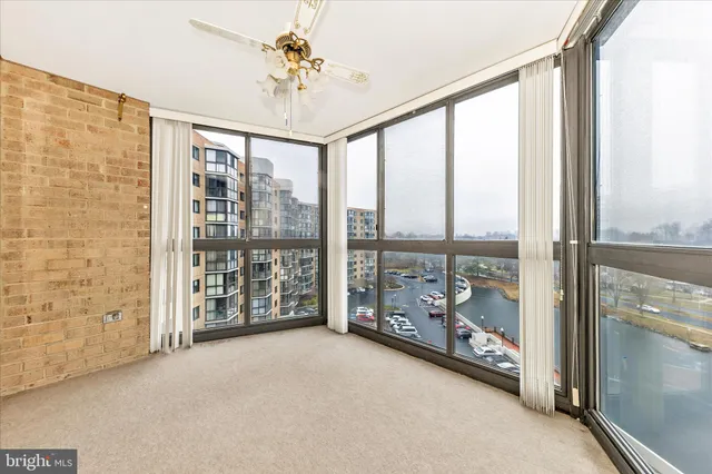 a living room with lots of furniture and a rug