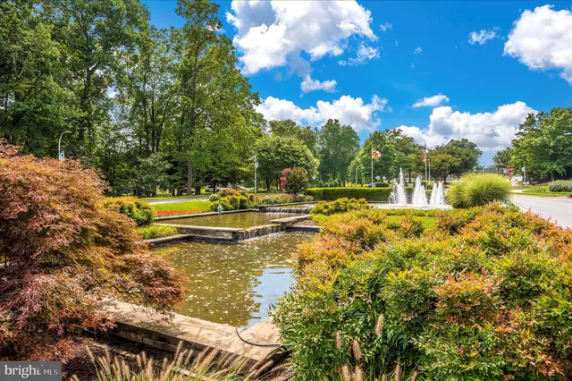 a view of a chairs and table on the balcony