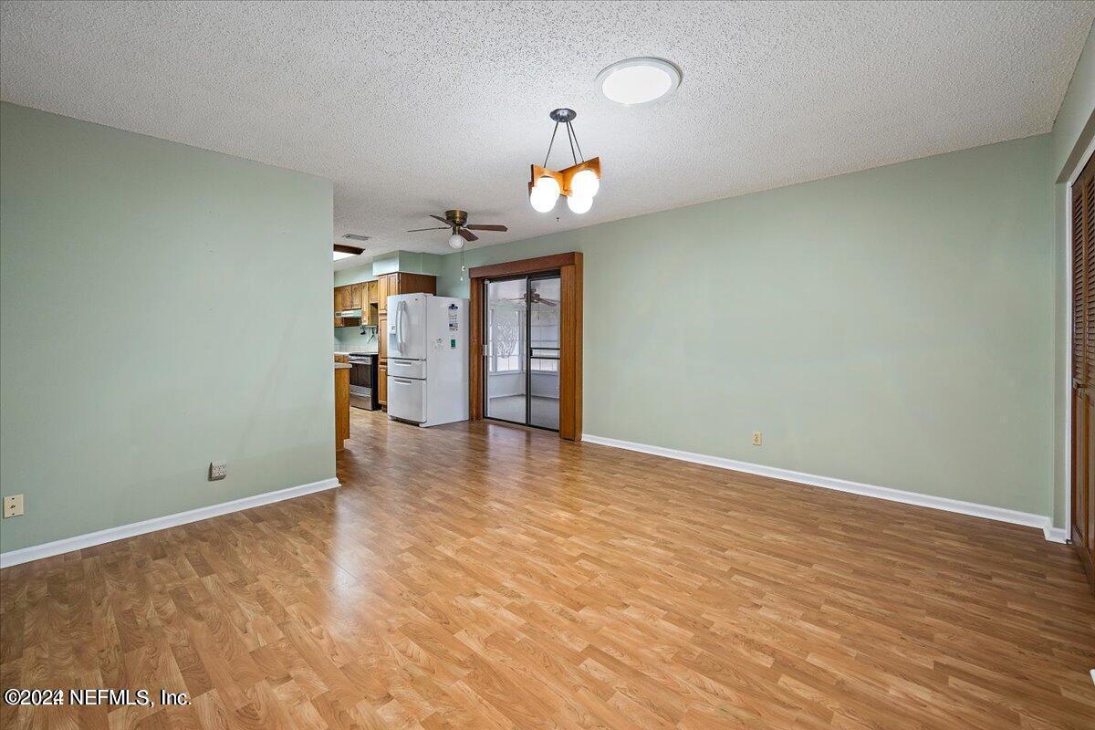 1328 Clements Road Jacksonville, FL 32211 - Photo 3 of 17 wooden floor in an empty room