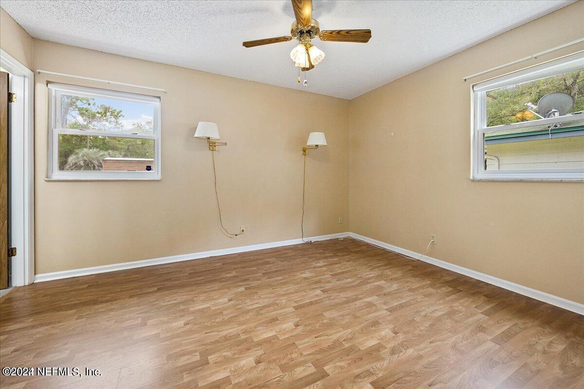 1328 Clements Road Jacksonville, FL 32211 - Photo 5 of 17 a view of an empty room with a painting on the wall