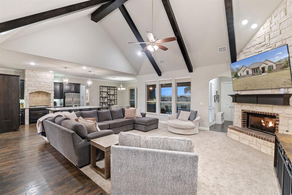 251 Hlavek Road Decatur, TX 76234 - Photo 11 of 33 a living room with furniture and a fireplace