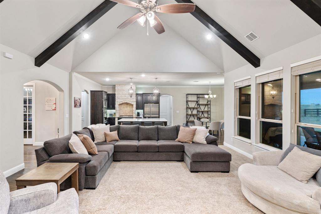 251 Hlavek Road Decatur, TX 76234 - Photo 13 of 33 a living room with furniture kitchen view and large windows