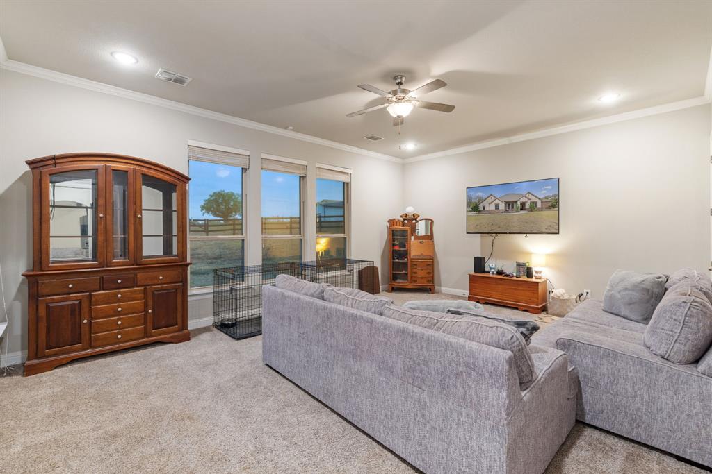 251 Hlavek Road Decatur, TX 76234 - Photo 31 of 33 a living room with furniture and a window