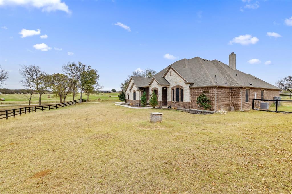 251 Hlavek Road Decatur, TX 76234 - Photo 4 of 33 a house view with a swimming pool