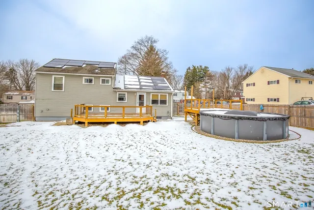 a view of a swimming pool with a lounge chairs