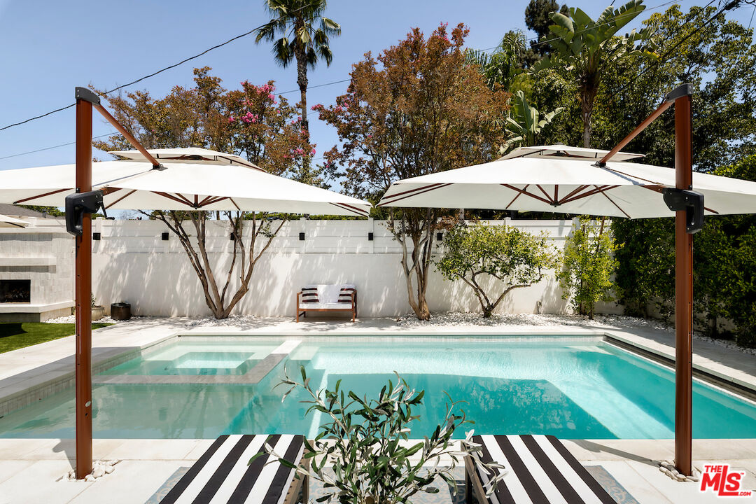 10421 Addison Street Toluca Lake, CA 91601 - Photo 2 of 2 a view of a swimming pool with a patio