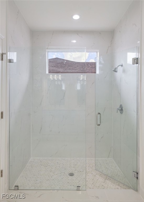 3216 13th Street Southwest Lehigh Acres, FL 33976 - Photo 16 of 23 a bathroom with a shower