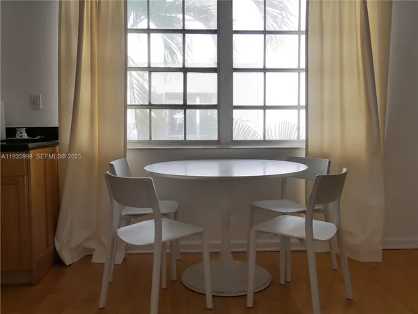 a table and chairs in a room