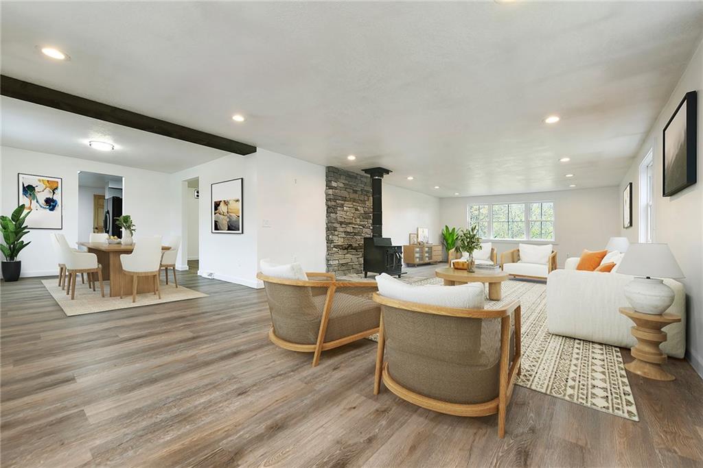 201 Joe Cain Road Bulger, PA 15019 - Photo 11 of 49 a living room with fireplace furniture and a wooden floor