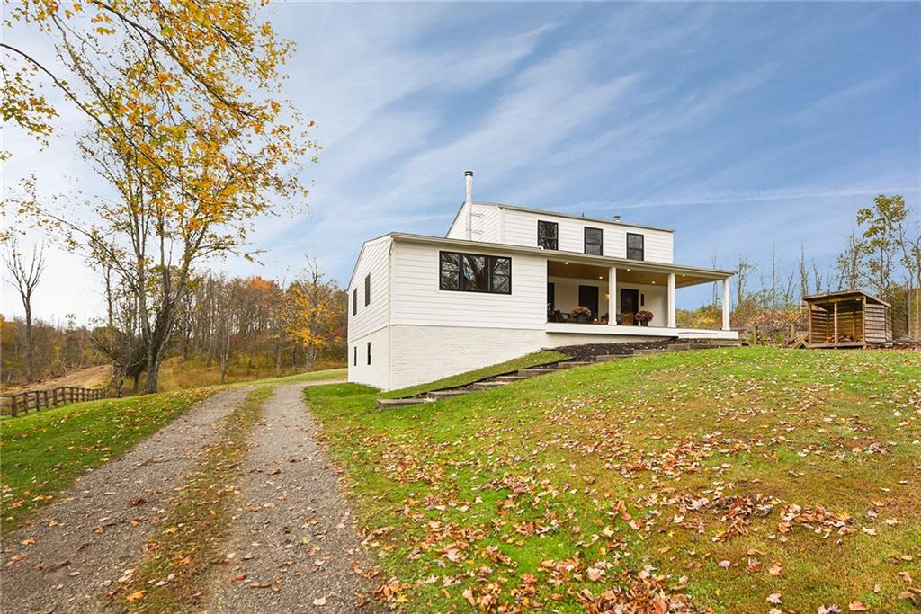 201 Joe Cain Road Bulger, PA 15019 - Photo 2 of 49 a front view of a house with a yard