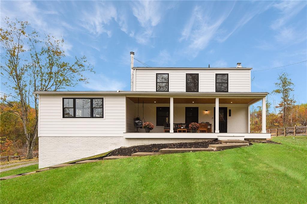 201 Joe Cain Road Bulger, PA 15019 - Photo 3 of 49 front view of a house with a yard